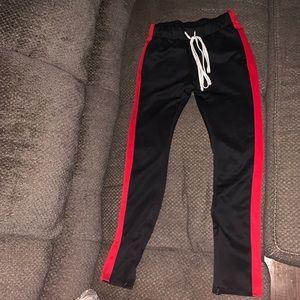 black red striped eptm track pants